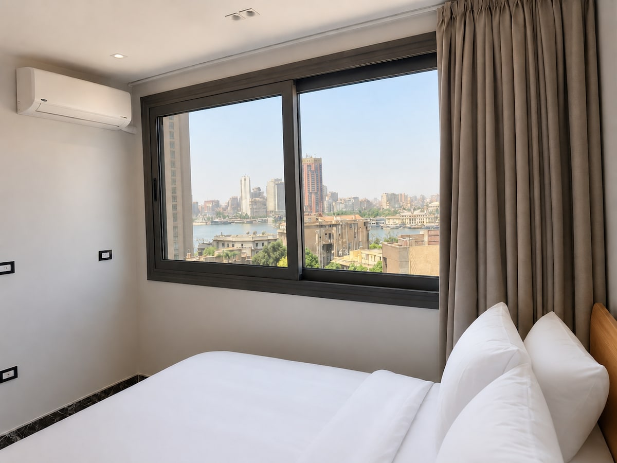 Garden City 2BR | Rooftop & Nile View -TUWA - 1